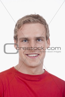 portrait of a young handsome man smiling - isolated on white