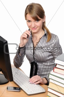  Business woman in front of her desktop computer