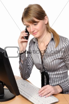  Business woman in front of her desktop computer