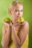 blond woman with green apple