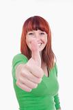 young cheerful woman showing thumbs up sign - isolated on white