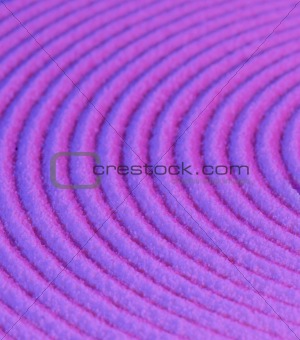 Abstract pattern - concentric circles on purple sand