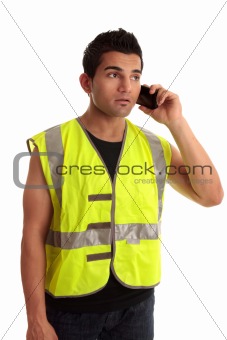 Builder tradesman takes a call