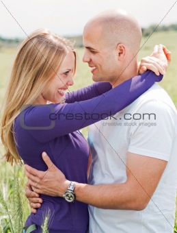 Men and woman hugging