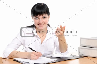 Woman sits at a table