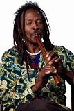 Rastafarian playing the flute