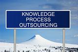 Road sign with text Knowledge Process Outsourcing