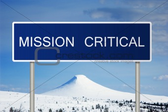 Road sign with text Mission Critical