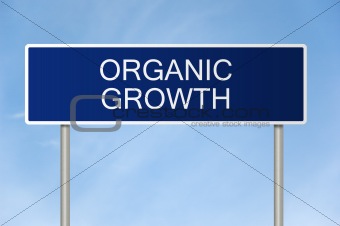 Road sign with text organic growth