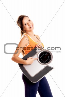 Athletic girl with a scale