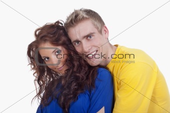 happy young couple - boy embracing girl, smiling - isolated on white