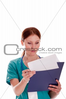 Medic looking at her report
