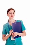 Young dental or clinical assistant with clipboard