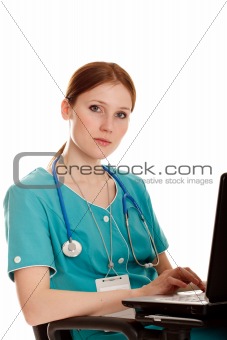 Young medical nurse with the laptop