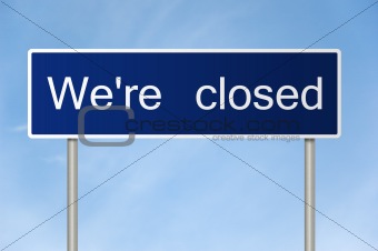 Road sign with text We're closed