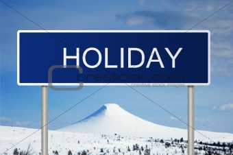 Road sign with text Holiday