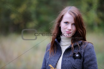 Beautiful young woman in forest