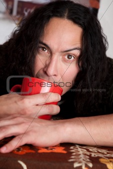 Tired man with coffee cup