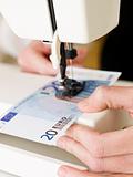 Sewing a Euro bank note