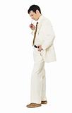 Thoughtful man in white business suit