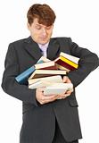 Man - student hold heap of books and textbooks