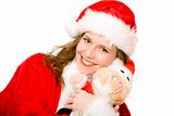 Young happy Santa Claus woman is holding Santa Claus doll