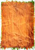 Orange paint on a crushed paper.