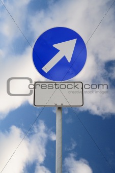 Arrow road sign with billboard