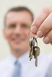 Real-estate agent handing over keys