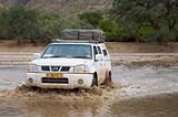 Crossing of a river by 4x4 in Namibia - Kaokoland