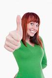 young cheerful woman showing thumbs up sign - isolated on white