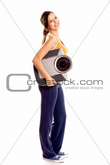 Athletic girl with a scale