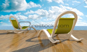 Deckchairs in front of sea