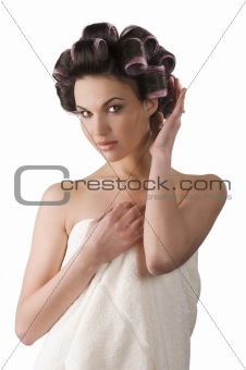 woman with hair rollers