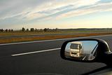 Trucks in the rear view mirror