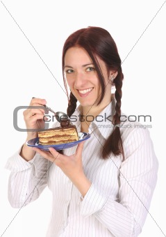 Beautiful woman eating piece of cake