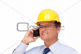 Handsome Contractor in Hardhat and Necktie Smiles as He Talks on His Cell Phone Isolated on a White Background.