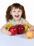 Happy laughing girl with apples