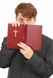 Priest defends the Scriptures