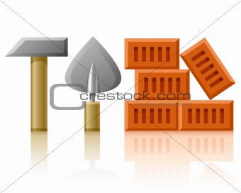 building tools hammer trowel and bricks