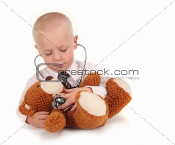 Doctor With Stethoscope and Teddy Bear as a Patient
