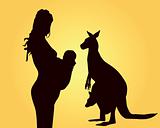 Silhouettes of the woman of mother and a kangaroo