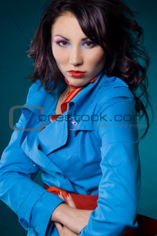 Sexy fashionable woman in blue jacket 