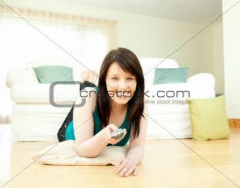 Charismatic woman watching television