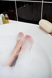 Feet in a bubble bath 