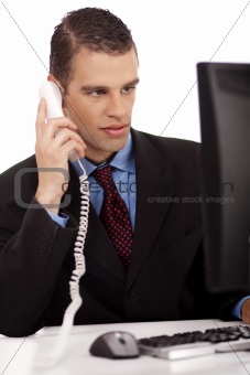 young profesional business men sitting and talking over phone
