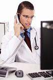 Male physician talking over phone