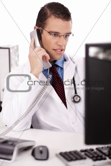 Male physician talking over phone