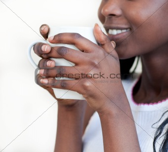 Radiant woman drinking a coffee 