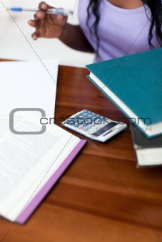 Close-up of a student doing her homework 